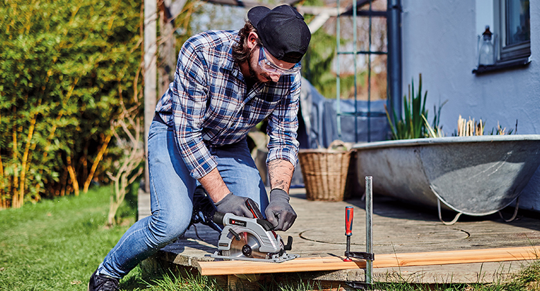 man using a circular saw